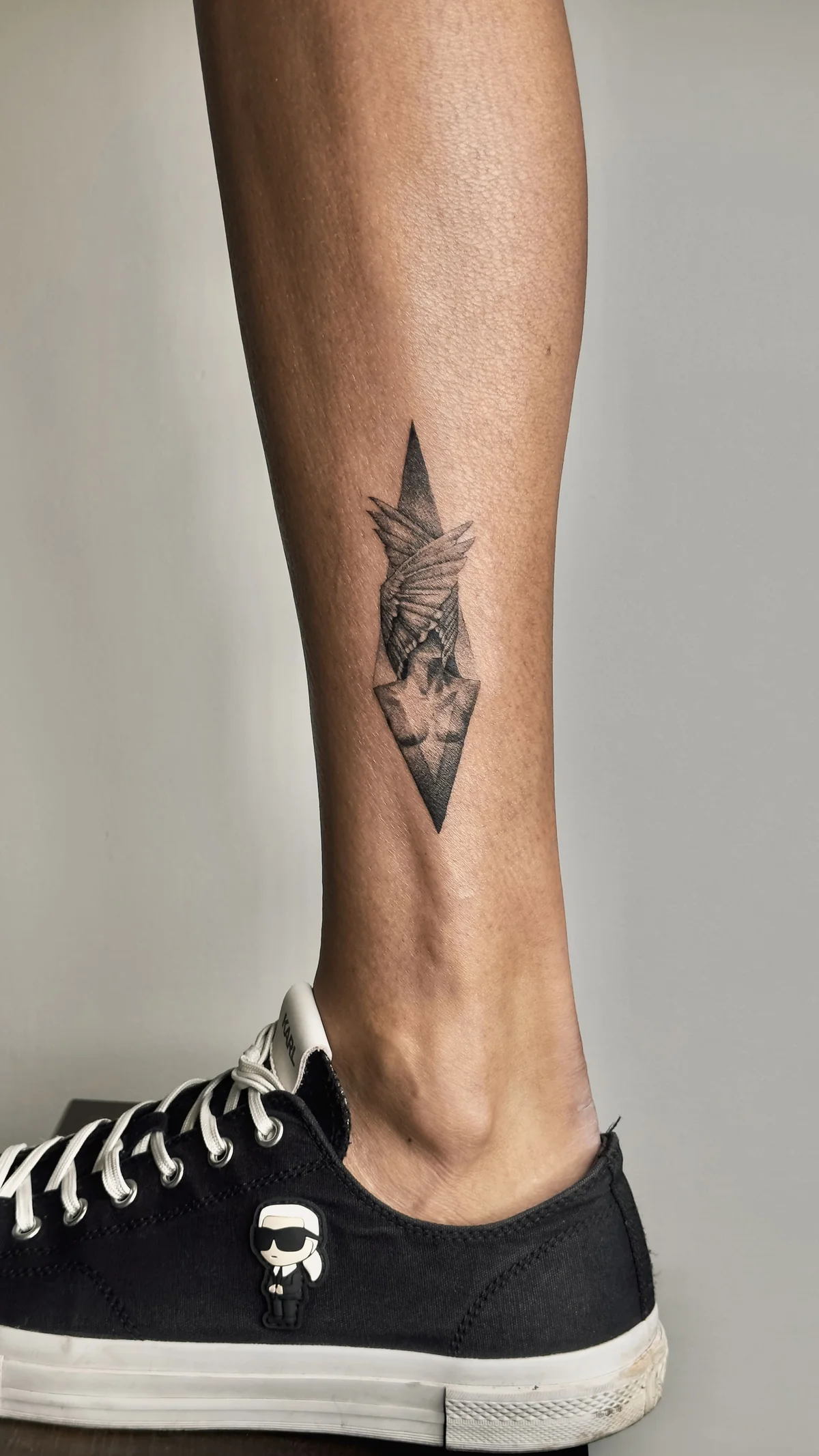 Native in geometry black and grey tattoo in Prague by Andrey Kovalov